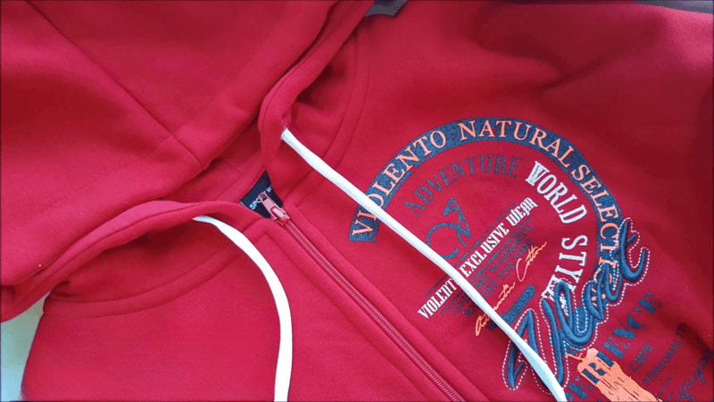red hoodie showcasing high quality custom embroidered hoodies