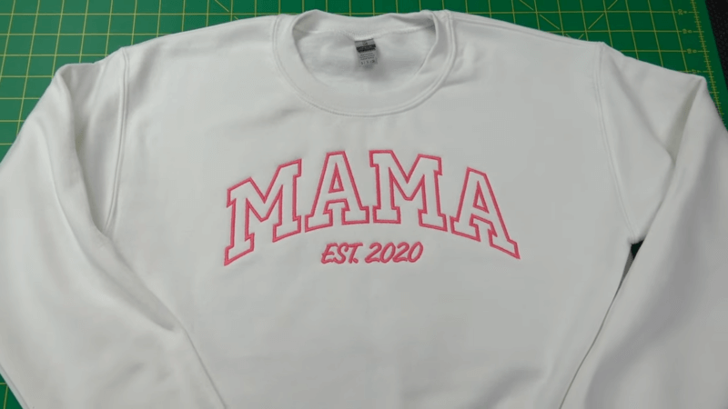 a white mama embroidered sweatshirt with the word 