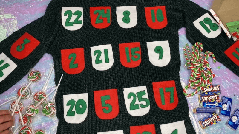 A christmas Embroidered sweatshirt with advent calendar decoration