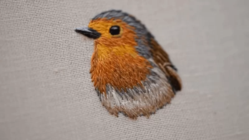 embroider a gift of a yellow bird portrait