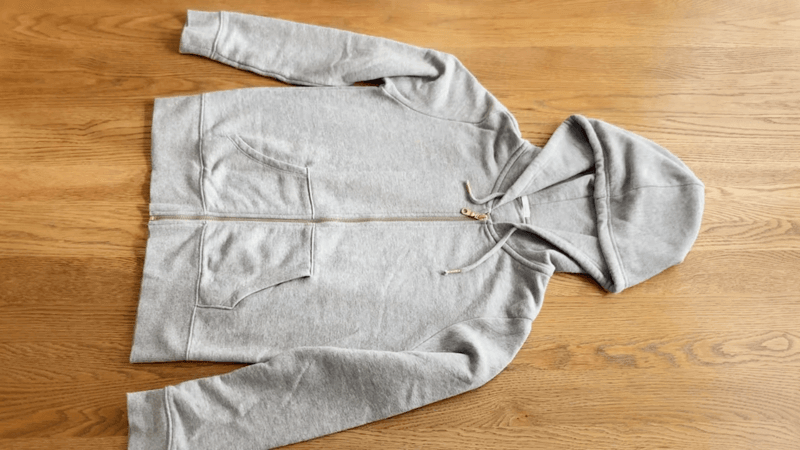 A white embroidered zip up hoodie